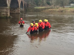 Practical Exercise for the cold water working training course. Wading in the river to understand how powerful the flow can be. 